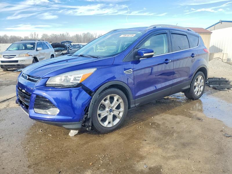 FORD ESCAPE TIT 2015 with VIN 1FMCU0J94FUC77598 - Photo from auction
