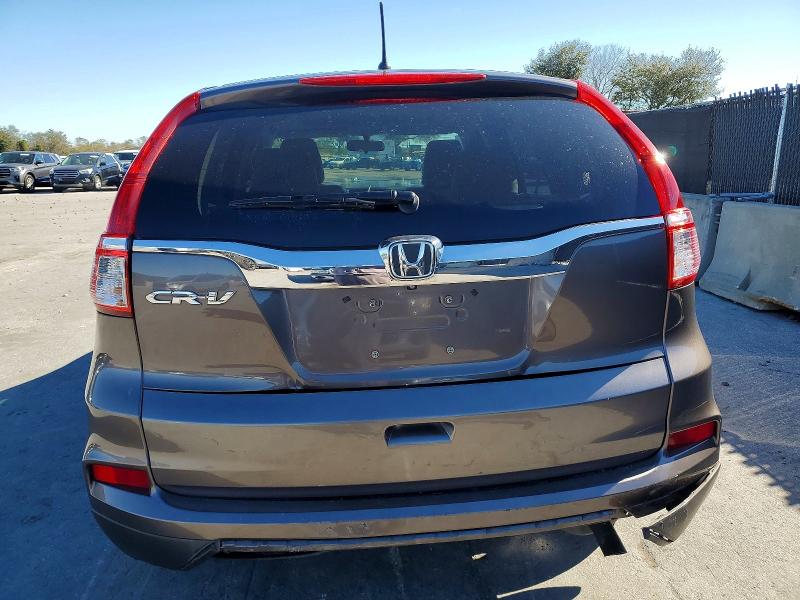 Photo 6 from auction – 2015 HONDA CR-V with VIN 2HKRM3H50FH526928