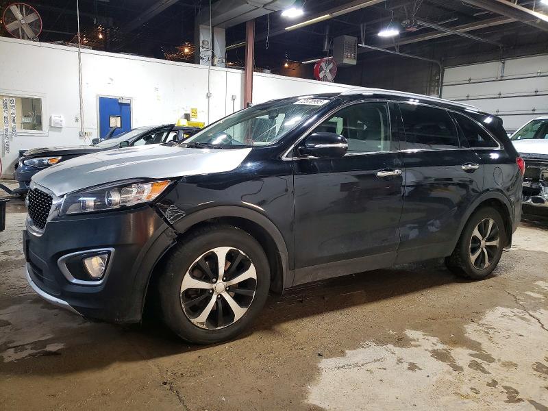 KIA SORENTO EX 2016 with VIN 5XYPHDA57GG123419 - Photo from auction