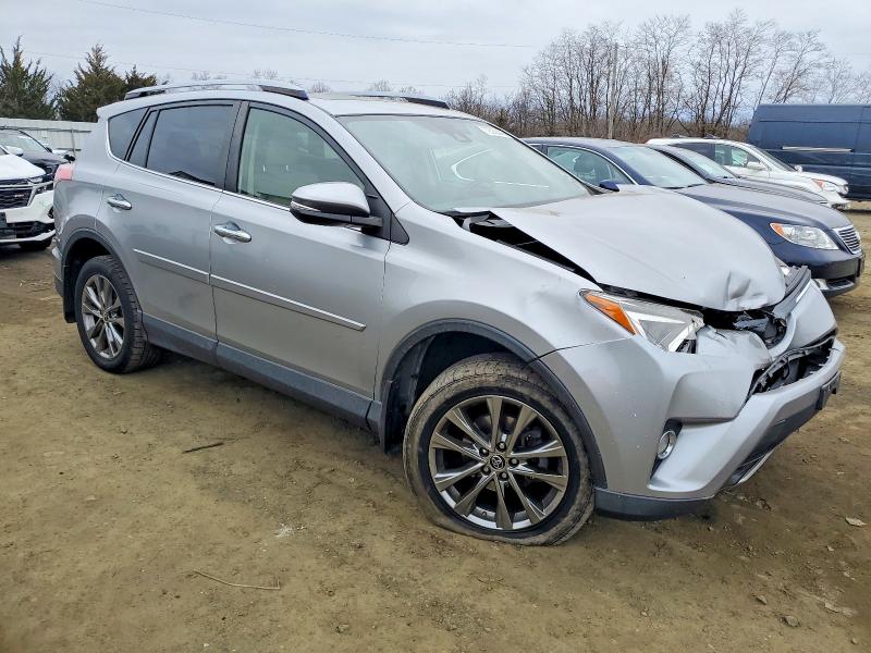 Photo 4 from auction – 2018 TOYOTA RAV4 LIMIT with VIN JTMDFREV0JJ246650