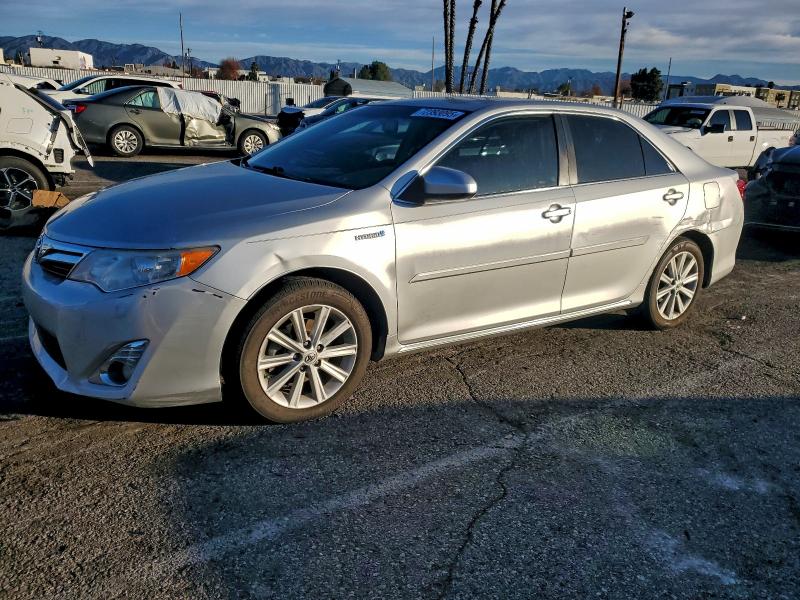 TOYOTA CAMRY HYBR 2012 with VIN 4T1BD1FK9CU056166 - Photo from auction