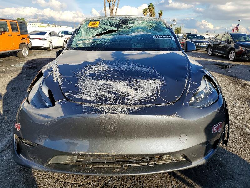 Photo 5 from auction – 2023 TESLA MODEL Y with VIN 7SAYGDEE9PF865977