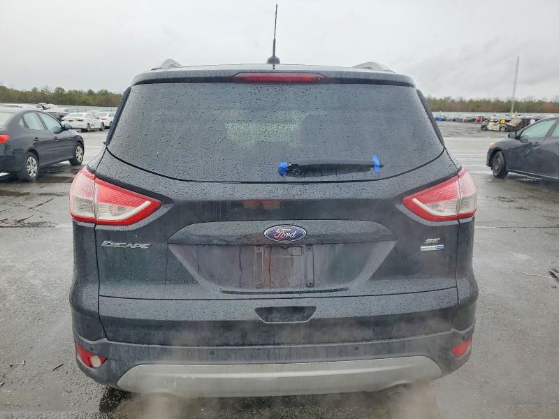 Photo 6 from auction – 2014 FORD ESCAPE with VIN 1FMCU9J98EUA23363