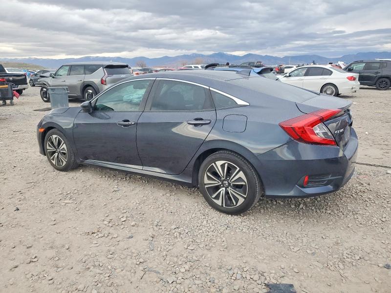 Photo 2 from auction – 2016 HONDA CIVIC with VIN 19XFC1F74GE016330