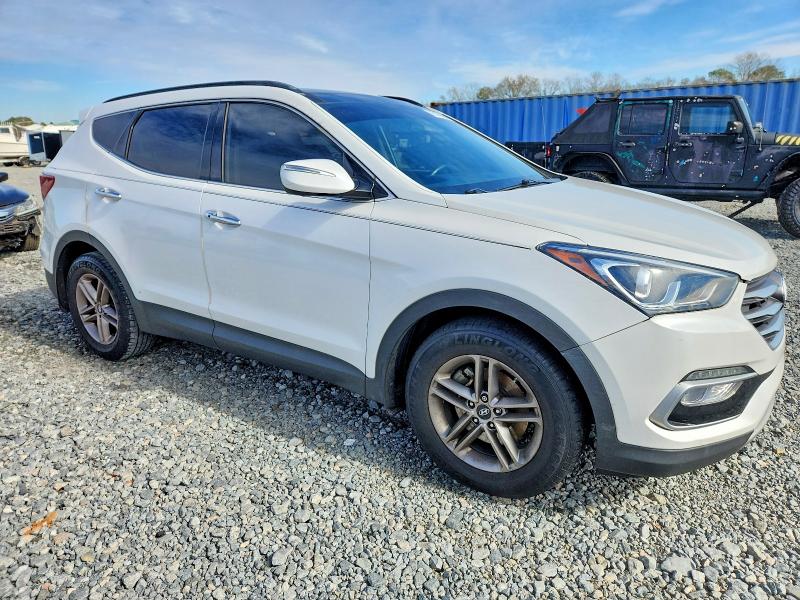 Photo 4 from auction – 2018 HYUNDAI SANTA FE S with VIN 5NMZU3LB9JH097761