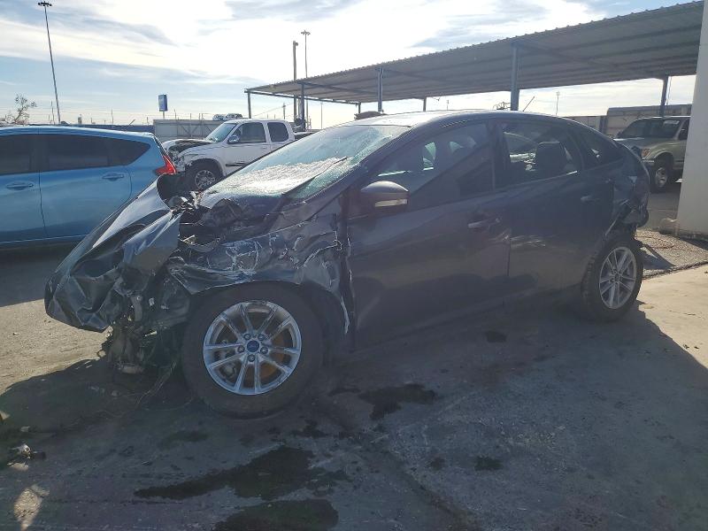 FORD FOCUS SE 2017 with VIN 1FADP3F24HL223262 - Photo from auction