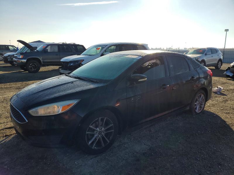 FORD FOCUS SE 2016 with VIN 1FADP3F21GL286575 - Photo from auction