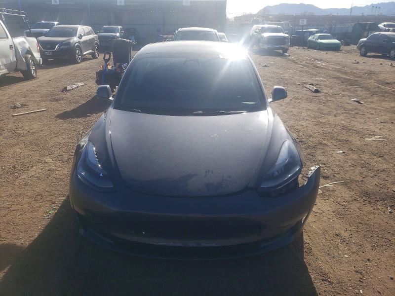 Photo 5 from auction – 2022 TESLA MODEL 3 with VIN 5YJ3E1EB6NF202302