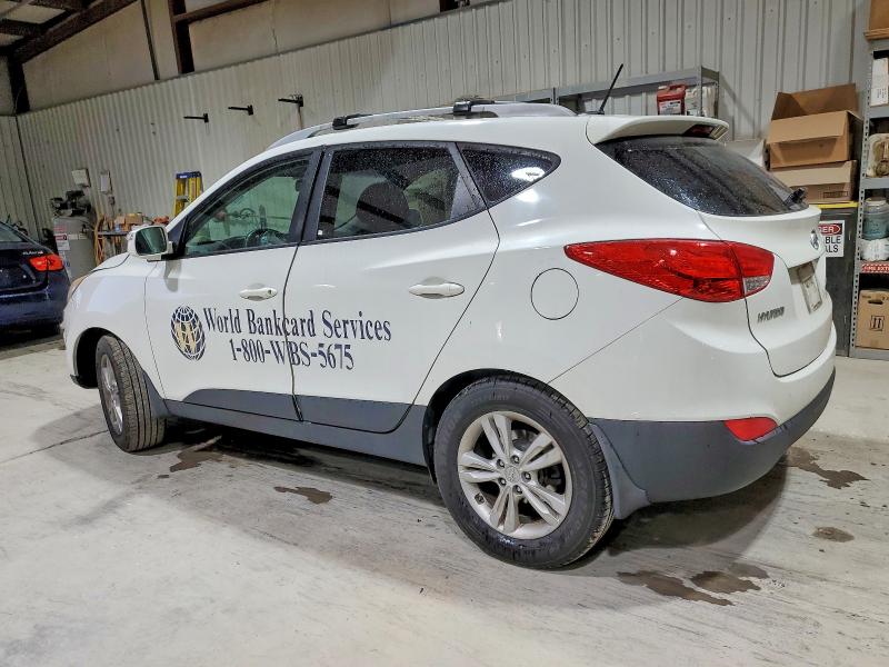 Photo 2 from auction – 2012 HYUNDAI TUCSON GLS with VIN KM8JUCAC3CU404356
