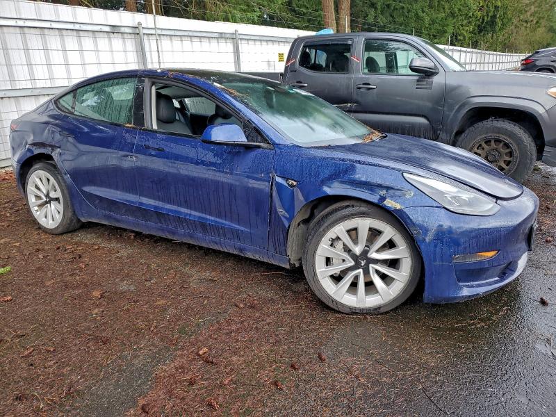 Photo 4 from auction – 2022 TESLA MODEL 3 with VIN 5YJ3E1EA7NF369887