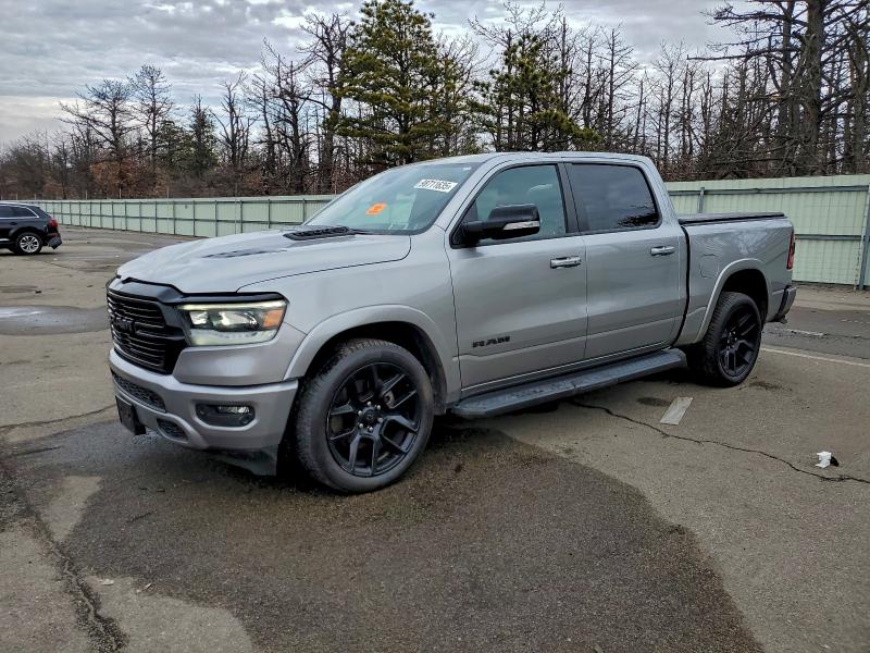 RAM 1500 LARAM 2021 with VIN 1C6SRFJT0MN549093 - Photo from auction