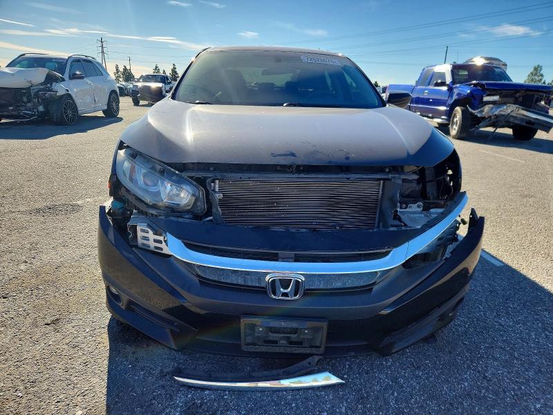 Photo 5 from auction – 2017 HONDA CIVIC with VIN 2HGFC1F76HH659396