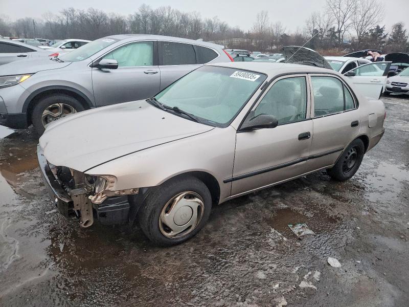 TOYOTA COROLLA 2000 with VIN 2T1BR12E8YC279597 - Photo from auction