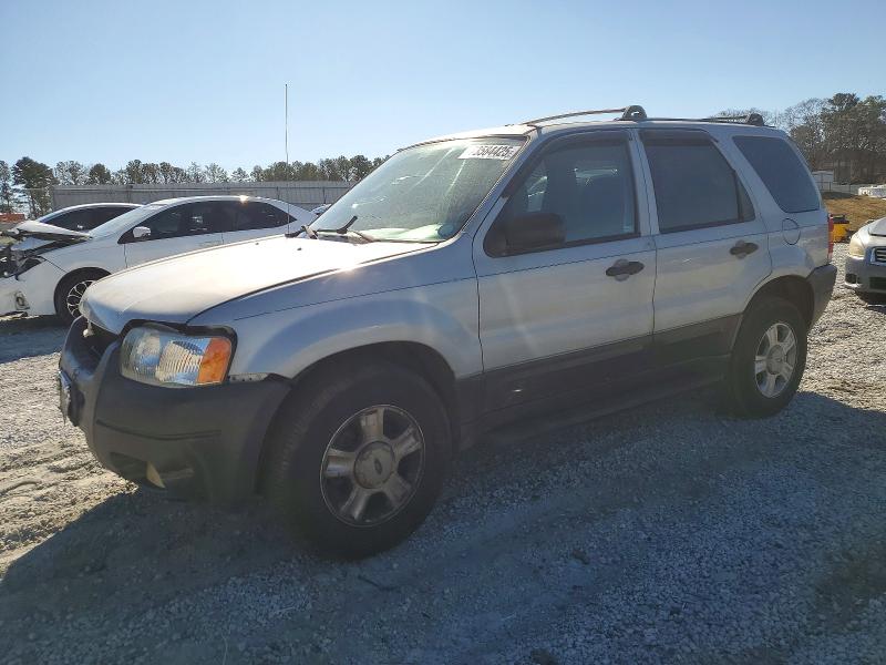 FORD ESCAPE 2003 with VIN 1FMYU03143KC87438 - Photo from auction