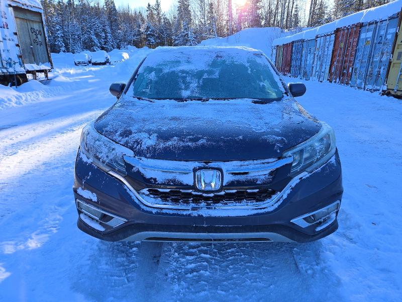 Photo 5 from auction – 2015 HONDA CR-V EX with VIN 2HKRM4H58FH102483