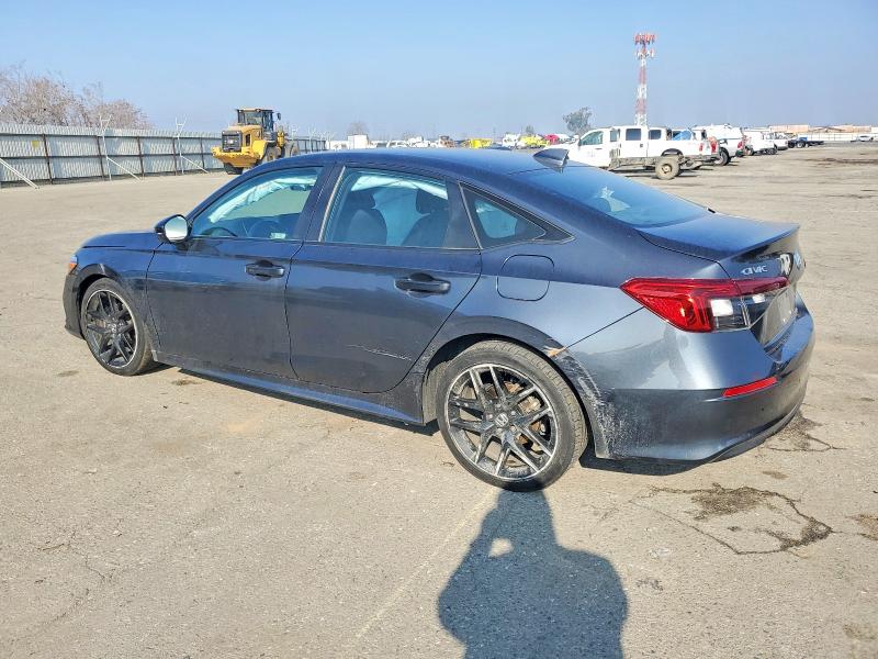 Photo 2 from auction – 2022 HONDA CIVIC SPOR with VIN 2HGFE2F51NH609905
