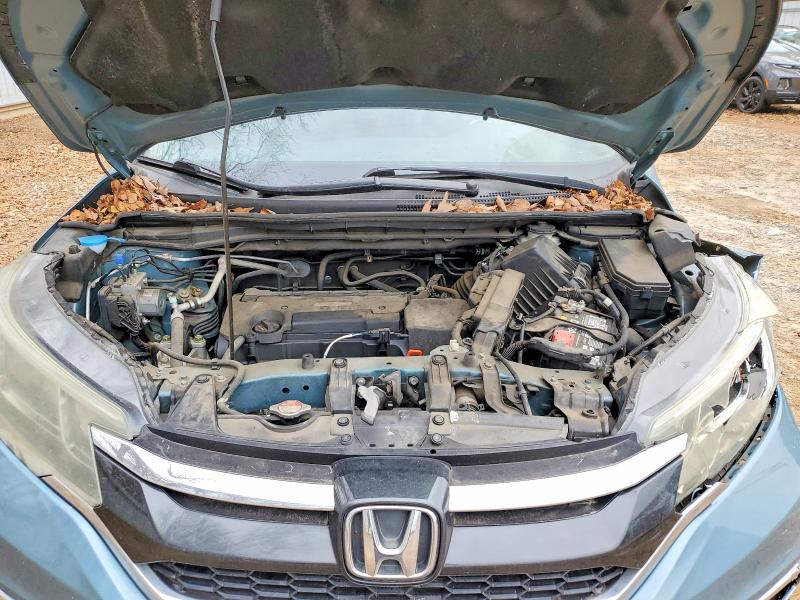Photo 12 from auction – 2016 HONDA CR-V with VIN 2HKRM3H72GH536881