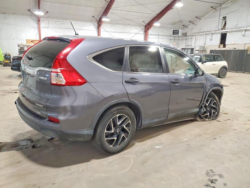 Photo 3 from auction – 2016 HONDA CR-V with VIN 5J6RM4H44GL132577