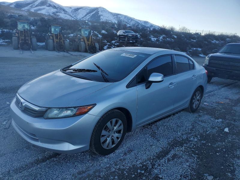 HONDA CIVIC LX 2012 with VIN 2HGFB2F5XCH303615 - Photo from auction