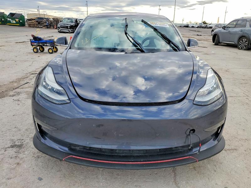 Photo 5 from auction – 2018 TESLA MODEL 3 with VIN 5YJ3E1EBXJF074379