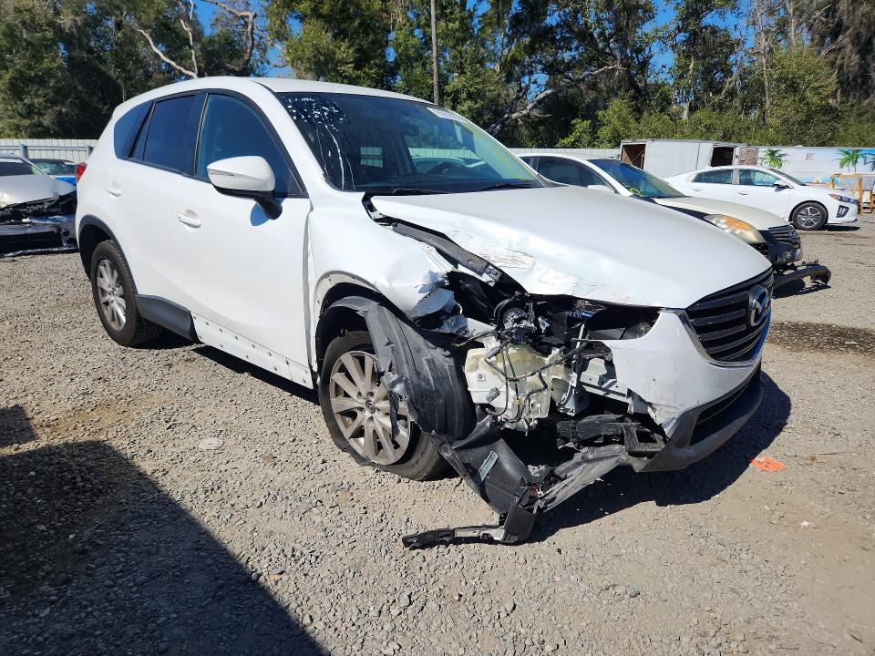 Photo 4 from auction – 2016 MAZDA CX-5 with VIN JM3KE2CY2G0787946