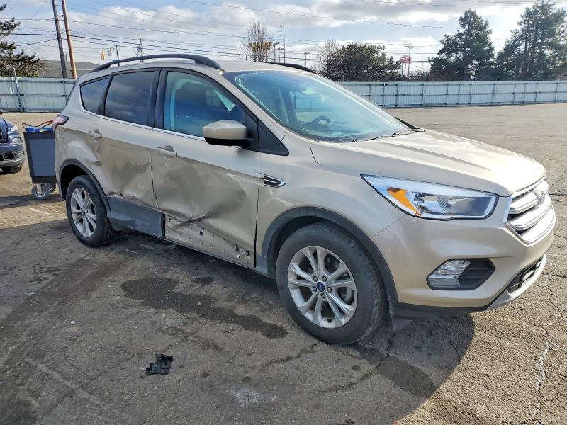 Photo 4 from auction – 2018 FORD ESCAPE with VIN 1FMCU0GD3JUB08256