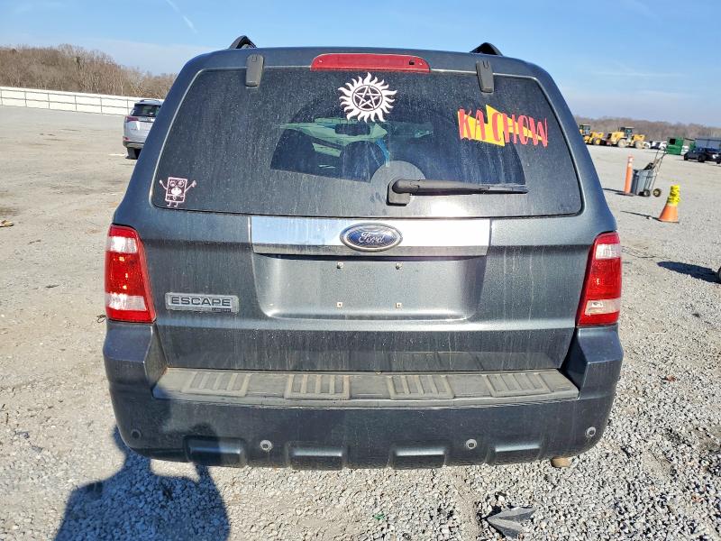 Photo 6 from auction – 2009 FORD ESCAPE with VIN 1FMCU04G79KB80020