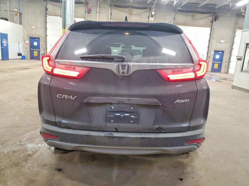 Photo 6 from auction – 2018 HONDA CR-V with VIN 7FARW2H55JE015957