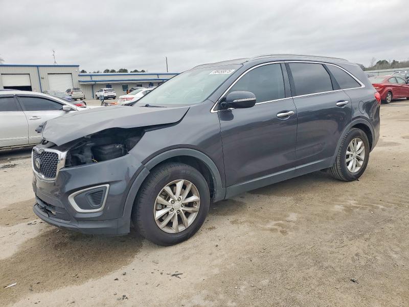 KIA SORENTO 2016 with VIN 5XYPG4A39GG157430 - Photo from auction