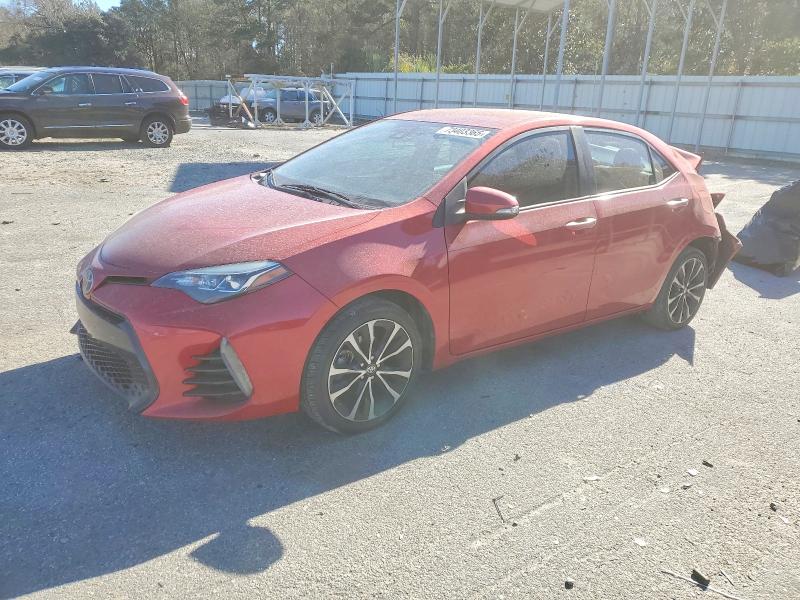 TOYOTA COROLLA L 2018 with VIN 5YFBURHE4JP795885 - Photo from auction