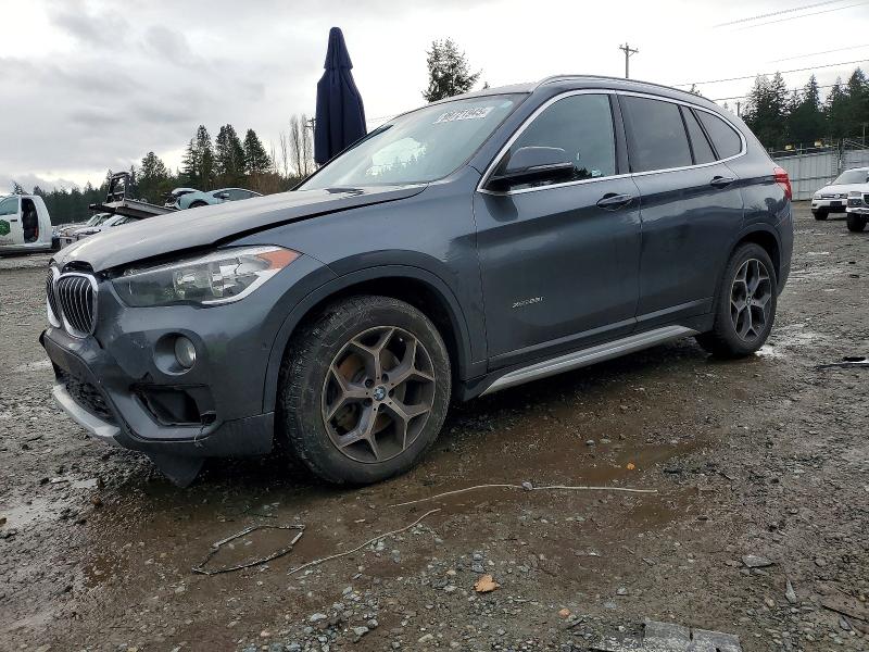BMW X1 2016 with VIN WBXHT3C38G5F64614 - Photo from auction