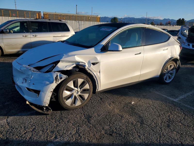 TESLA MODEL Y 2021 with VIN 5YJYGAEE8MF235407 - Photo from auction