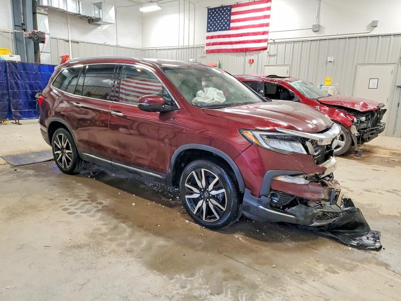 Фото 4 с аукциона – 2022 HONDA PILOT ELIT с VIN 5FNYF6H06NB074847