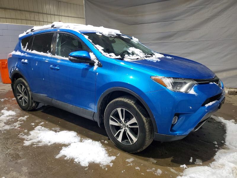 Photo 4 from auction – 2016 TOYOTA RAV4 XLE with VIN 2T3RFREV4GW476207