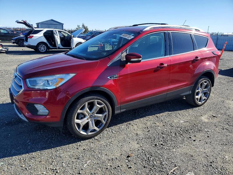 FORD ESCAPE TIT 2019 with VIN 1FMCU9J91KUB79787 - Photo from auction