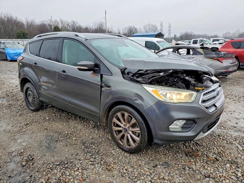 Photo 4 from auction – 2017 FORD ESCAPE TIT with VIN 1FMCU0J90HUB30875