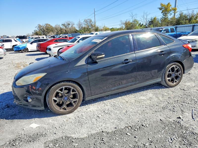 FORD FOCUS SE 2014 with VIN 1FADP3F2XEL204128 - Photo from auction