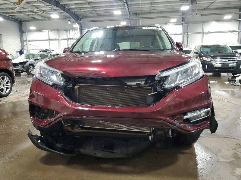 Photo 5 from auction – 2015 HONDA CR-V EXL with VIN 5J6RM4H76FL079759