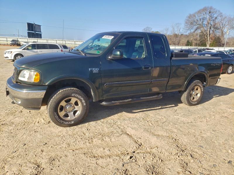 FORD F150 2002 with VIN 1FTRX18W12KA29936 - Photo from auction
