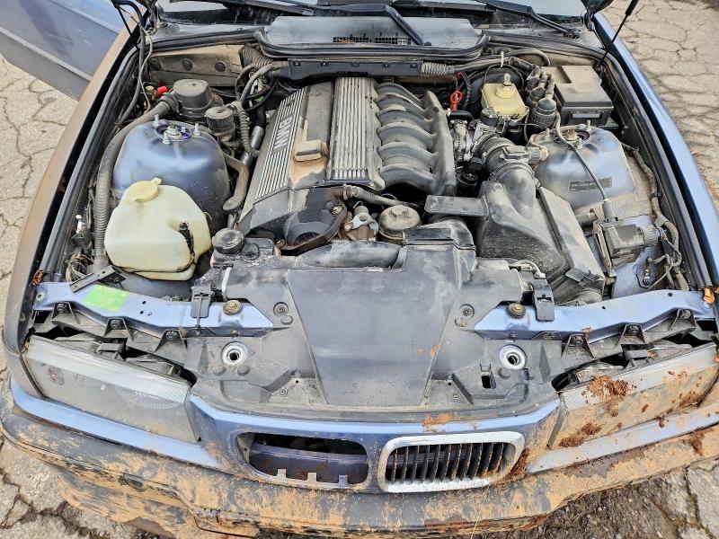 Photo 11 from auction – 1999 BMW 323 IC AUT with VIN WBABJ8334XEM25936
