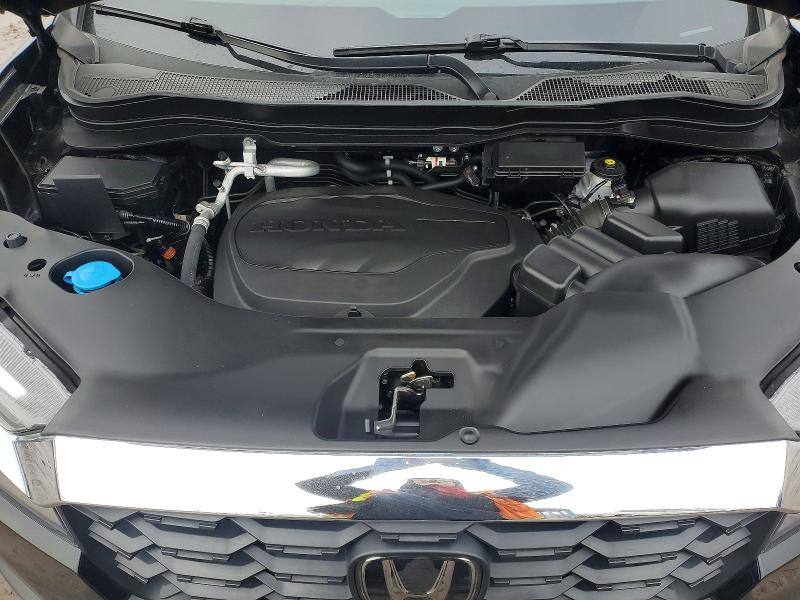Photo 12 from auction – 2022 HONDA PASSPORT with VIN 5FNYF8H59NB030462