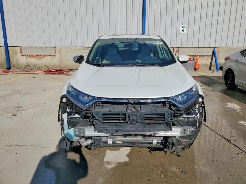 Photo 5 from auction – 2019 HONDA CR-V with VIN 7FARW1H80KE017783