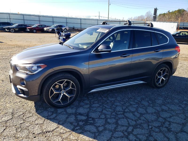 BMW X1 2017 with VIN WBXHT3Z32H4A65273 - Photo from auction