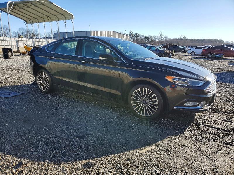 Photo 4 from auction – 2017 FORD FUSION TIT with VIN 3FA6P0D92HR211264
