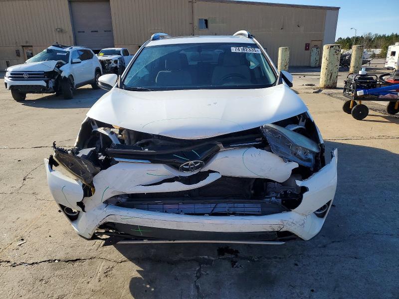 Photo 5 from auction – 2016 TOYOTA RAV4 XLE with VIN JTMWFREV2GJ060352