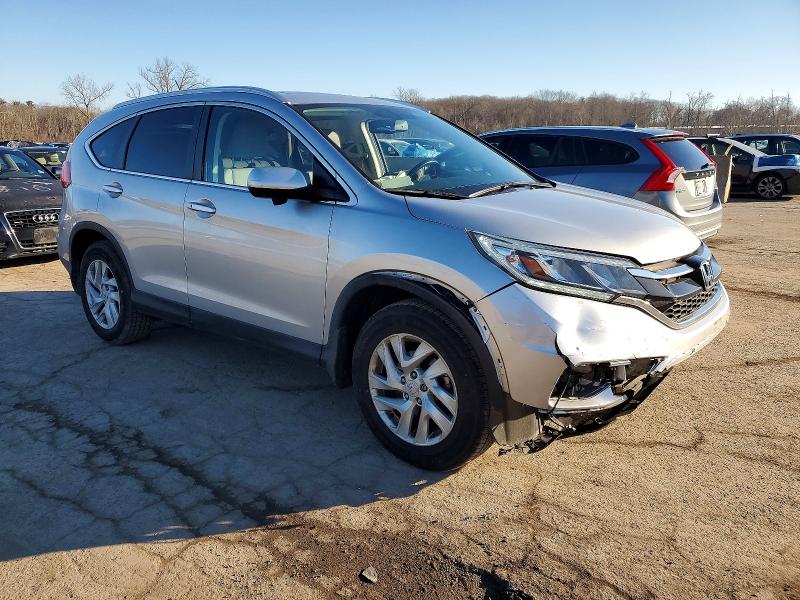 Photo 4 from auction – 2015 HONDA CR-V EXL with VIN 5J6RM4H75FL030553