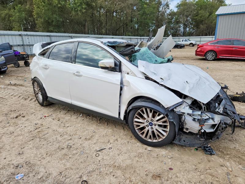 Photo 4 from auction – 2016 FORD FOCUS with VIN 1FADP3J21GL266415