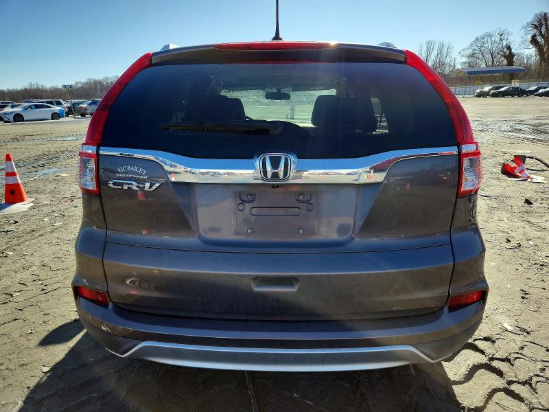 Photo 6 from auction – 2016 HONDA CR-V with VIN 2HKRM3H75GH515815