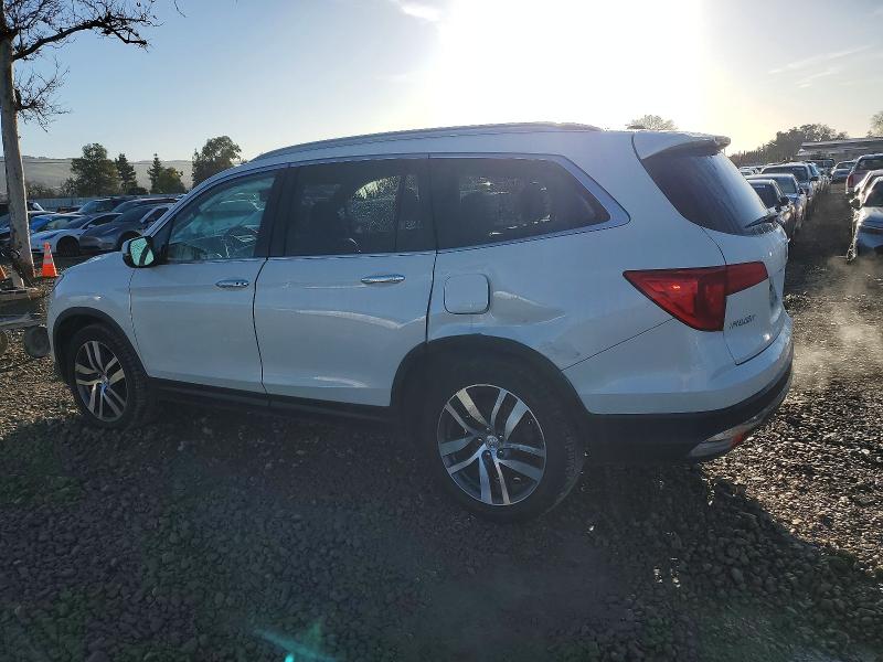 Foto 2 de la subasta – 2016 HONDA PILOT TOUR con VIN 5FNYF6H91GB076930
