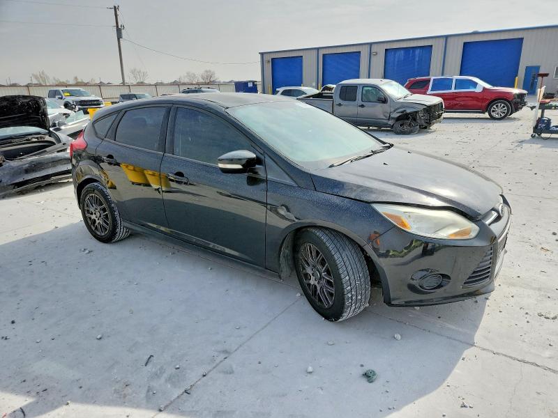 Photo 4 from auction – 2014 FORD FOCUS with VIN 1FADP3K25EL249127